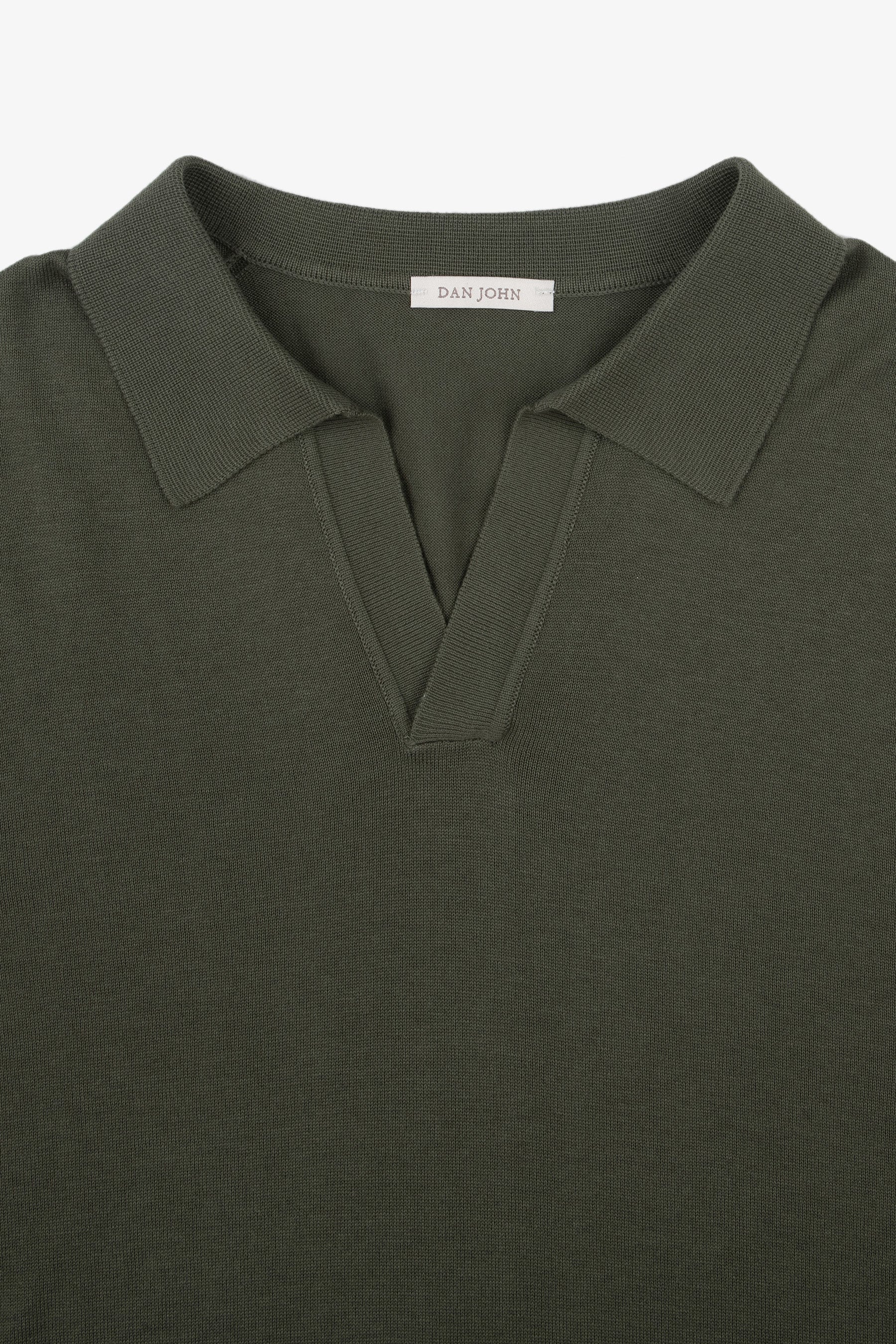 Dark green knit polo shirt with a ribbed spread collar and V-neck opening.