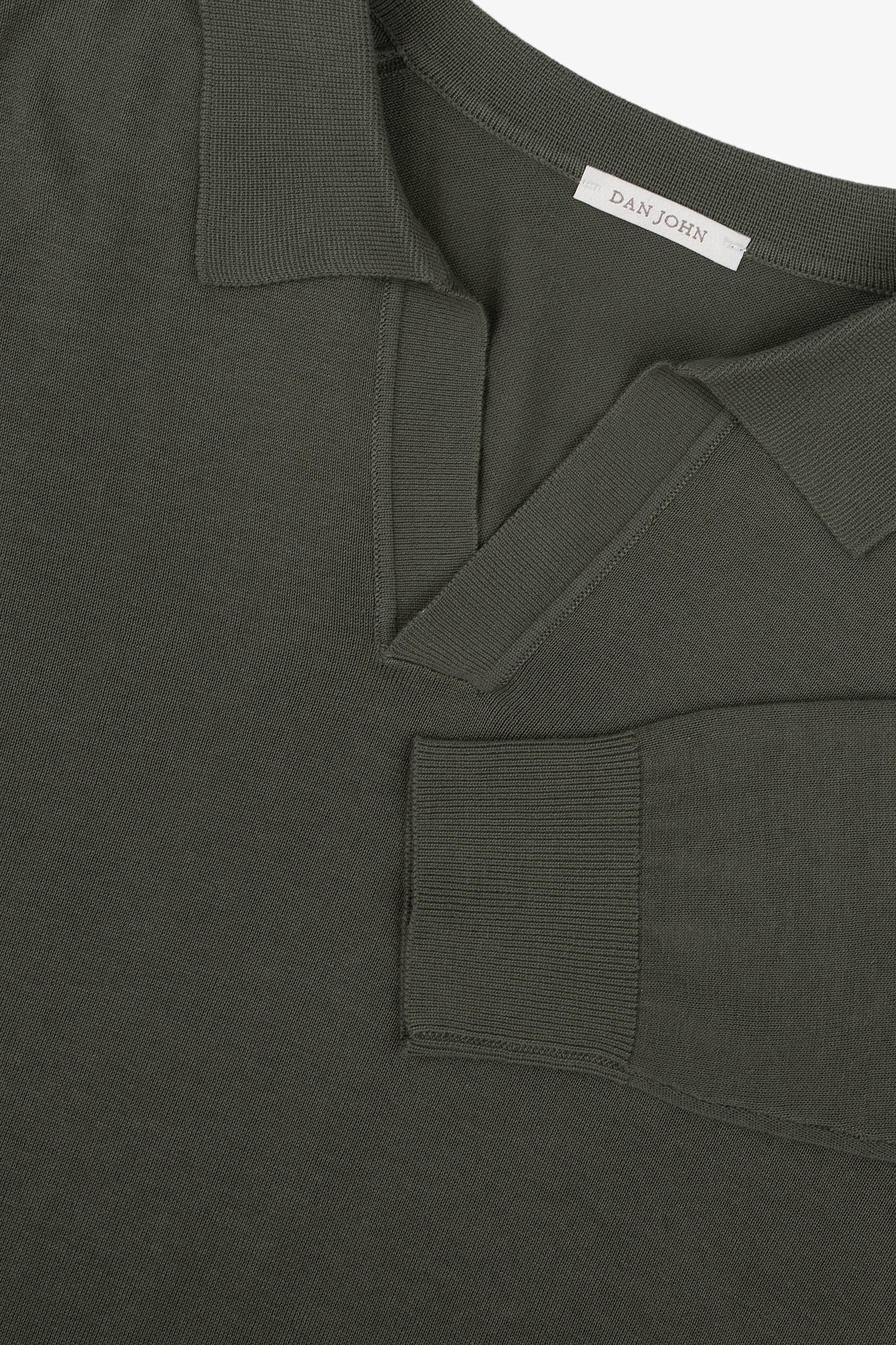 Dark green knitwear top with a polo collar, open V-neck placket, and ribbed cuffs on long sleeves.