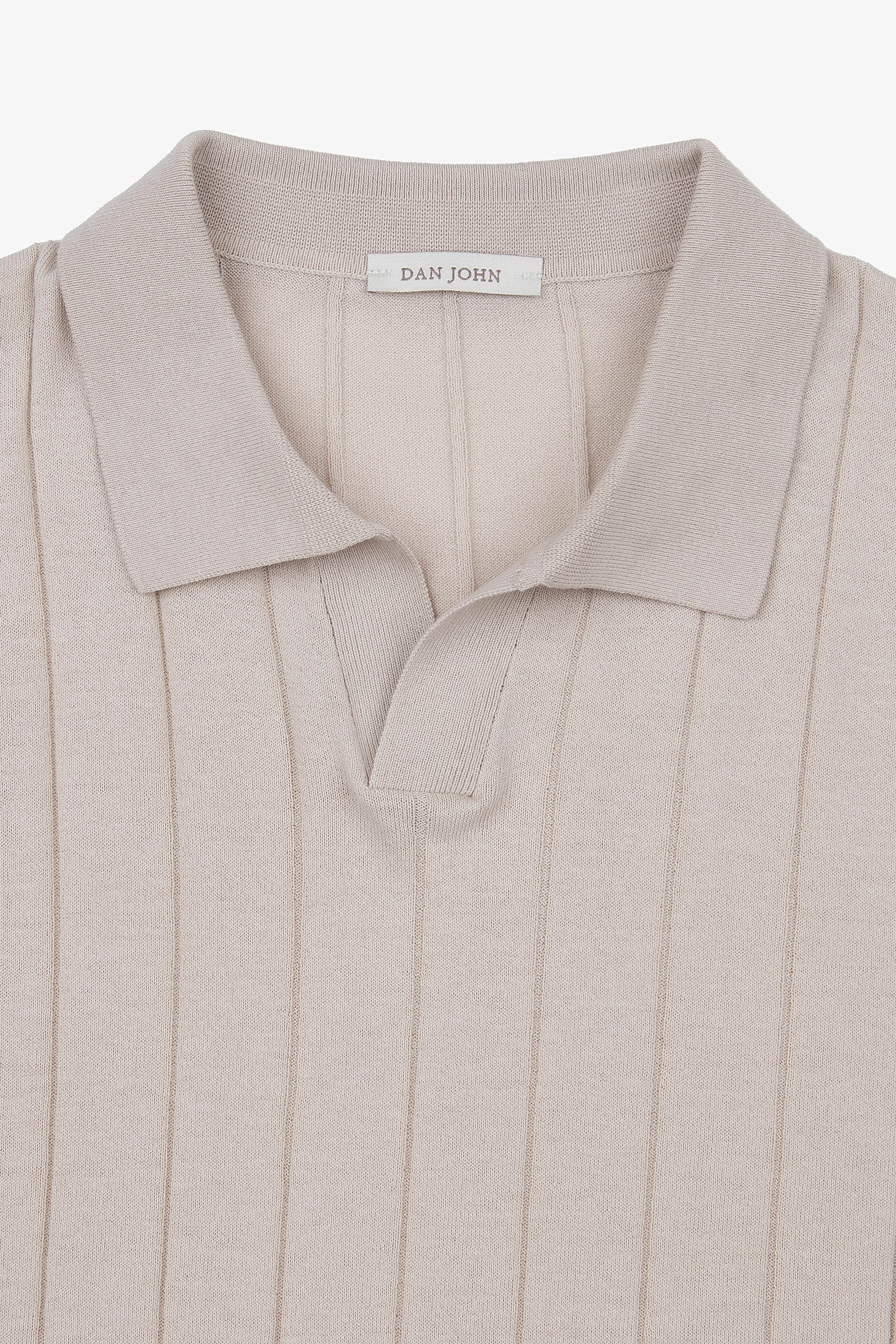 Light beige short-sleeve ribbed knit polo shirt with a spread collar and V-neck placket.