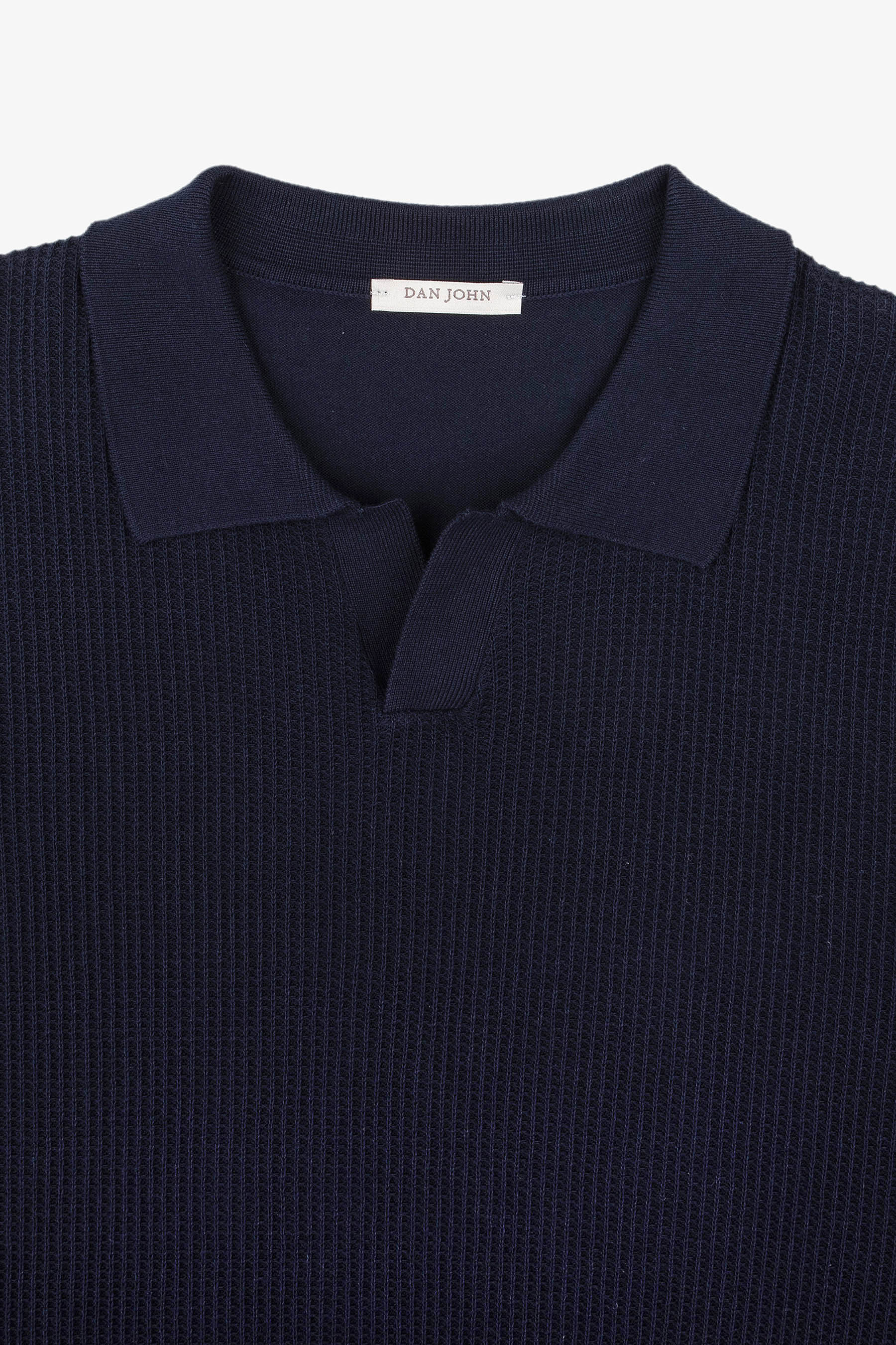 Navy ribbed knit polo shirt with a collar and V-neck opening.