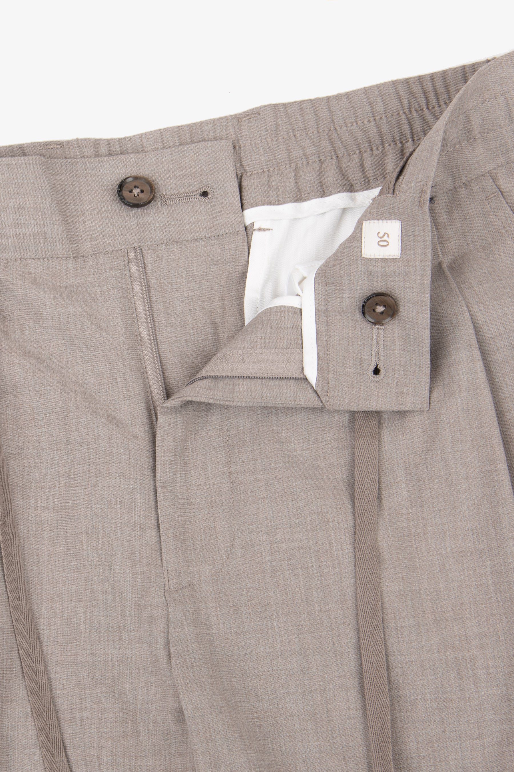 Taupe trousers with an elasticated back waist, button fly closure, and a matching herringbone drawstring.