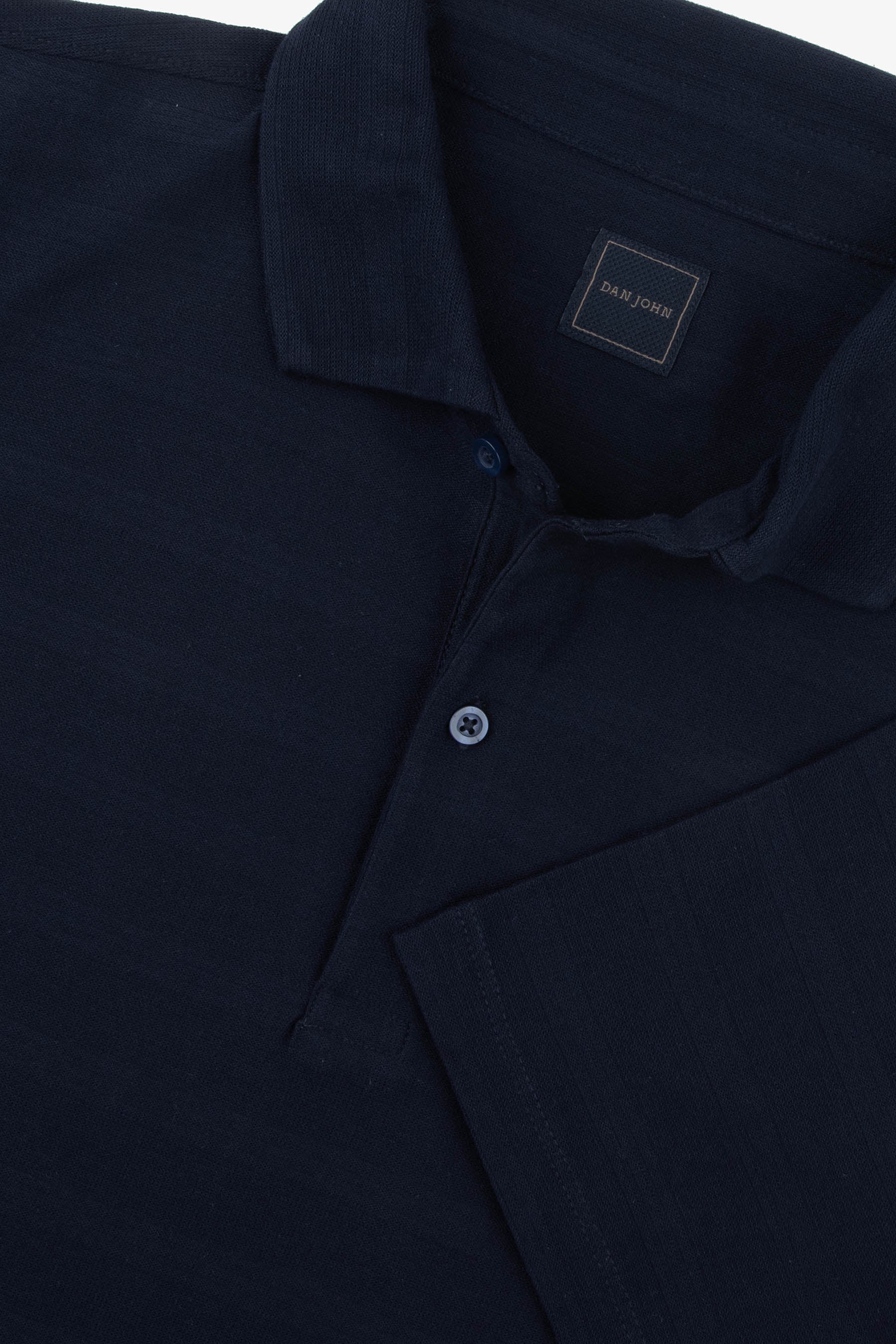 Dark blue short-sleeve polo shirt with a ribbed collar, two-button placket, and dark blue buttons.