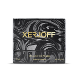 The luxury packaging for the Xerjoff Blanc De Noir candle, featuring a white and grey marble-patterned box with a prominent gold "X" logo and gold-stamped product name.