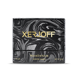 The Noir De Noir scented candle displayed inside its open luxury gift box, featuring a black glass holder decorated with a gold geometric star design and the Xerjoff emblem.