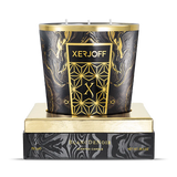 The 750g Blanc De Noir scented candle displayed in its open, premium presentation box, showing the oversized black glass holder with its intricate gold star-patterned label and the embossed Xerjoff "X" logo.