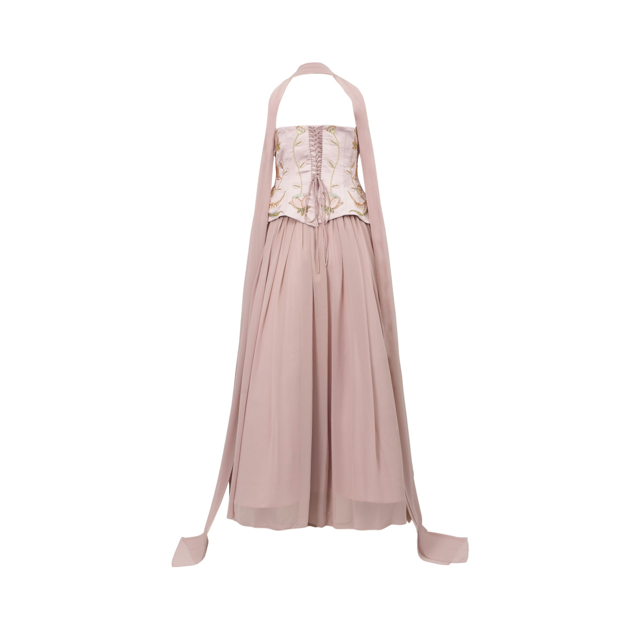 Mauve halter dress with a corset-style bodice, front lacing, gold-toned floral embroidery, and a flowing maxi skirt. Long tie