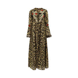 Front view of ZAWJA leopard print maxi kaftan featuring red floral embroidery on the chest and feather-trimmed sleeves.