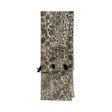Close-up of the ZAWJA matching leopard print sheila with gold sequin details and small black tassel trims.