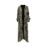 Full view of the ZAWJA 3-piece set featuring a leopard print sequined open abaya worn over a long black inner dress.