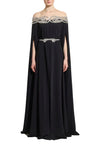 Zuhair Murad black off-the-shoulder cady evening gown featuring an intricate silver crystal-embellished neckline and an integrated floor-length cape available at BLUE SALON.