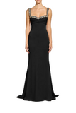 A floor-length black gown with a sweetheart neckline and ornate silver beaded shoulder straps, shown on a model against a plain white background.