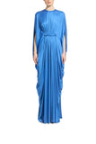 Zuhair Murad cornflower blue jersey maxi gown featuring an integrated cape design, a ruched waistband, and fluid draped details available at BLUE SALON.