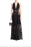 Zuhair Murad black halter neck maxi dress featuring intricate macramé lace inserts at the waist and hem with a gold-buckled belt available at BLUE SALON.