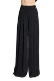 Zuhair Murad black cady high-waisted trousers featuring deep front pleats and a dramatic floor-sweeping wide-leg silhouette available at BLUE SALON.