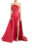 Zuhair Murad raspberry red strapless Mikado silk evening gown featuring a draped bodice, high leg slit, and a dramatic trailing overskirt available at BLUE SALON.