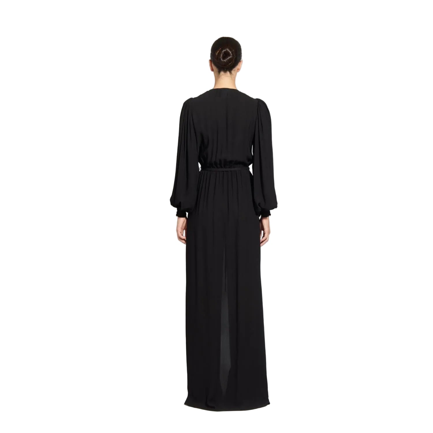 Rear view studio shot of a model highlighting the clean, fluid draping, gathered shoulders, and sleek hair bun of the black Zuhair Murad long-sleeve evening gown, from the BLUE SALON.