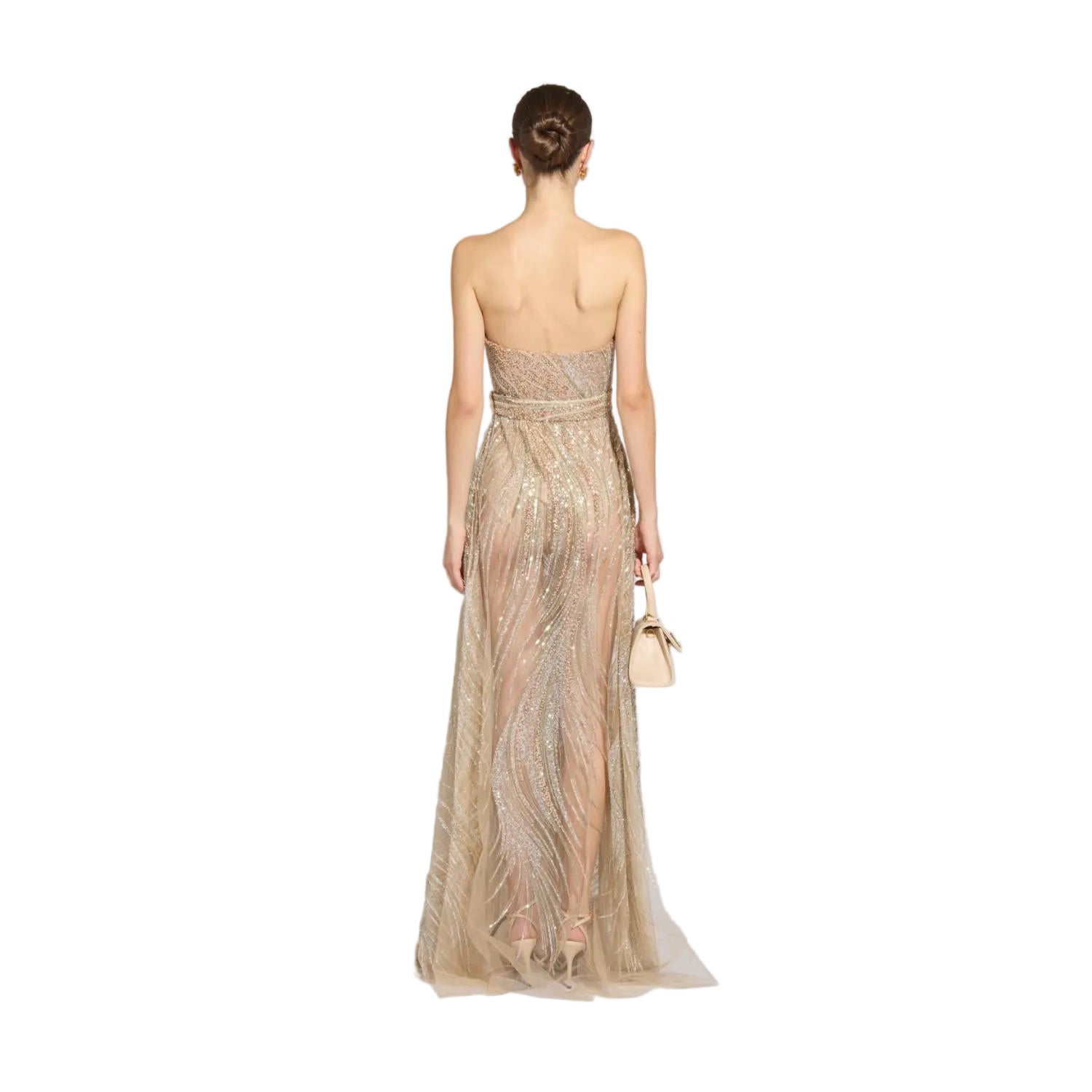 Rear view studio shot of a model showing the back details, sleek hair bun, and shimmering sheer gold wave embroidery of the Zuhair Murad strapless tulle gown, from the BLUE SALON.
