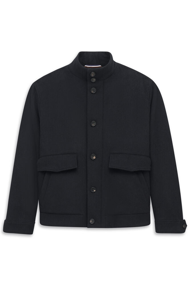 Dark navy stand collar jacket with a full button-front closure, two flap pockets, and two side entry pockets.
