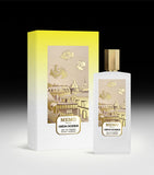 Frosted glass perfume bottle with a gold-toned faceted cap and a label showing a Parisian cityscape with gold-toned rosebuds.