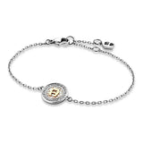 Aigner women's two-tone bracelet featuring a silver-tone rhodium chain and a circular charm with a gold-plated A-logo and crystal border.