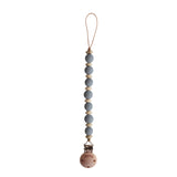 Mushie Kids Pacifier Clip Ari Stone: A Stylish and Functional Way to Keep Your Baby's Pacifier Secure