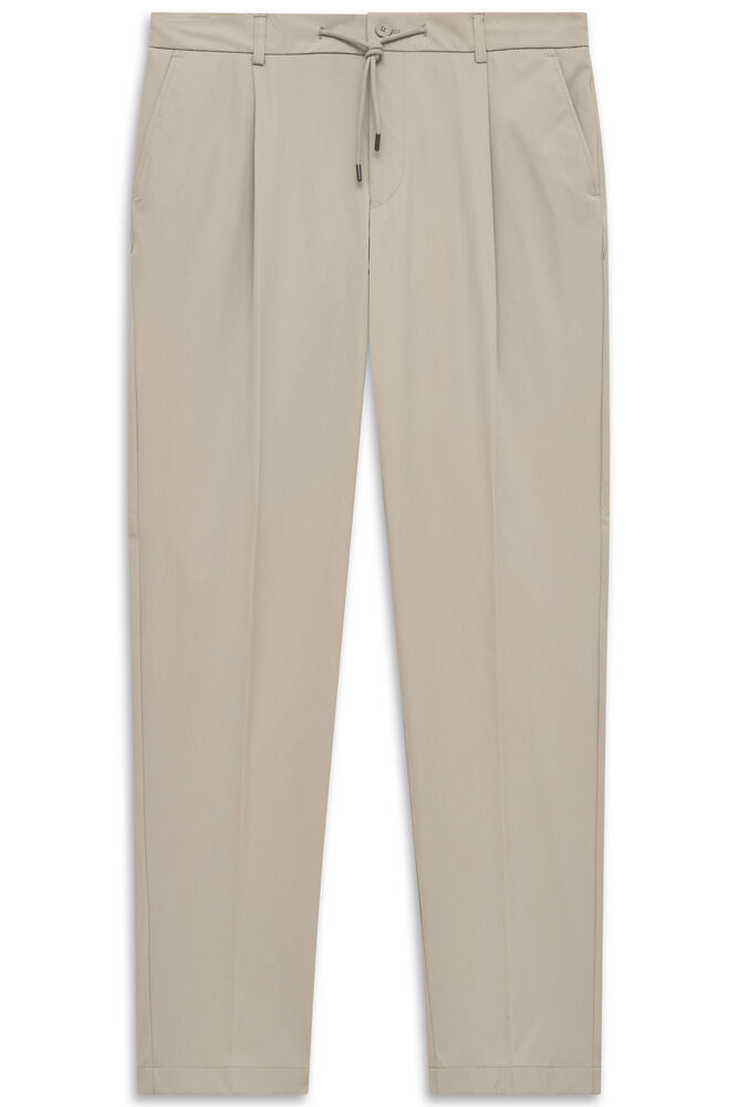 Beige casual pleated trousers with a drawstring waist, button and zip closure, and side pockets.