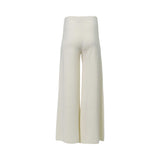 BEYE back view women's smooth ivory cream wide-leg knit pants with a high-waisted fit, isolated on a white background.