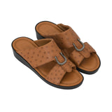 Top Side profile highlighting the slim, elegant silhouette and ostrich leather strap texture.