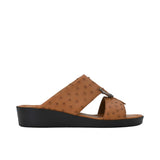 Side profile highlighting the slim, elegant silhouette and ostrich leather strap texture.
