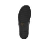 Underside view of the grey rubber sandal showing the grip pattern for wet surfaces.