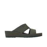 Side profile view highlighting the unique pixelated texture on the straps and chunky sole.