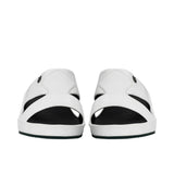 Top-down view of Brotini 37427 men's white gum rubber sandals showing the wide strap design.