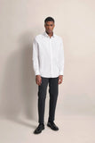 White long-sleeve casual shirt with a pointed collar, button-down front, and single-button cuffs.