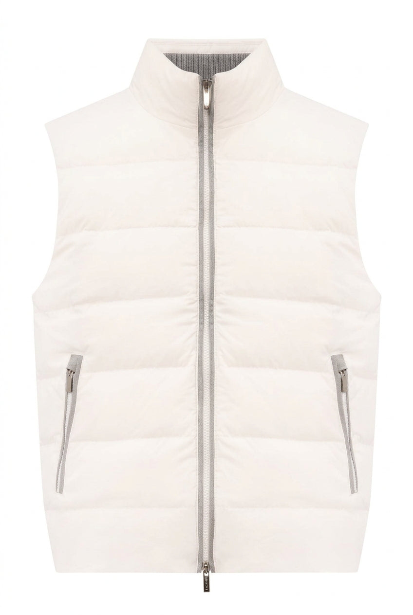 Luminous beige quilted vest with a stand collar, grey knit inner collar, full-length grey zipper, and two grey zippered pocke