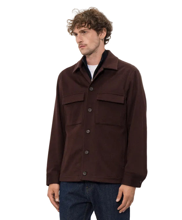 Burgundy red collared jacket with button-front closure, two chest flap pockets, and buttoned cuffs.