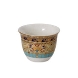 Close-up of a handleless ceramic gawa cup featuring intricate traditional motifs and gold trim.