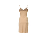 Back view of the inner slip dress showing the V-neck cut and tailored seams.