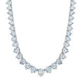 Silver-toned graduated round necklace featuring brilliant clear faceted stones in individual settings.