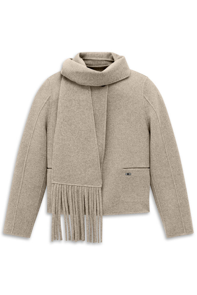 Beige felted jacket with a stand collar and a matching fringed scarf draped around the neck. It has a right welt pocket with