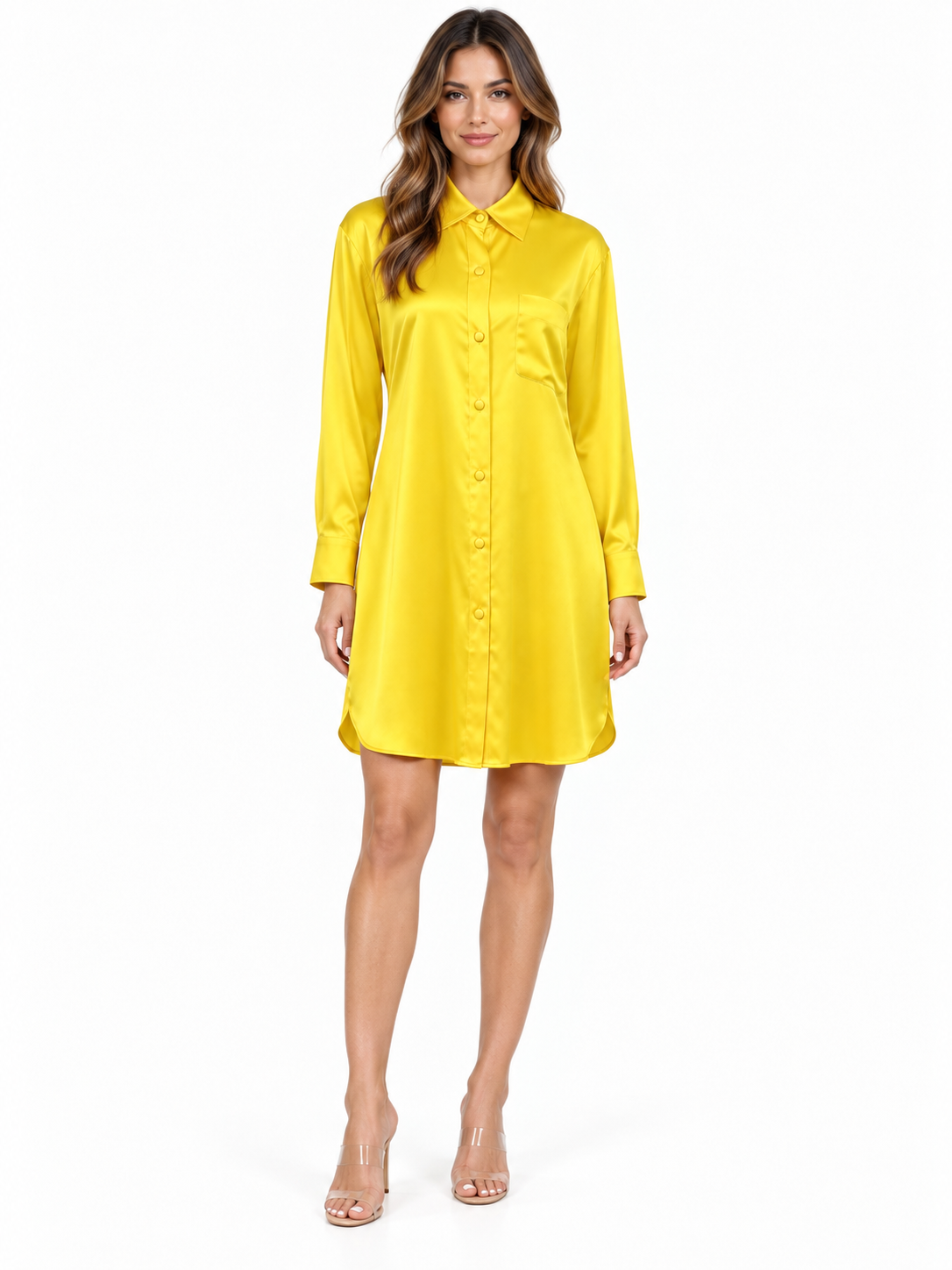 Yellow silk shirt dress with a pointed collar, long sleeves, buttoned cuffs, a chest pocket, and a curved hem.