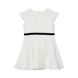 Back view of the ivory David Charles dress showing the structured A-line silhouette, velvet waist ribbon, and hidden zipper closure.