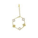 Girls' gold-tone clover bracelet with three white pearlescent charms and two crystal-encrusted charms on a white background.