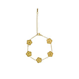 David Charles girls' gold-tone bracelet featuring five uniform textured sunburst flower charms on a white background.