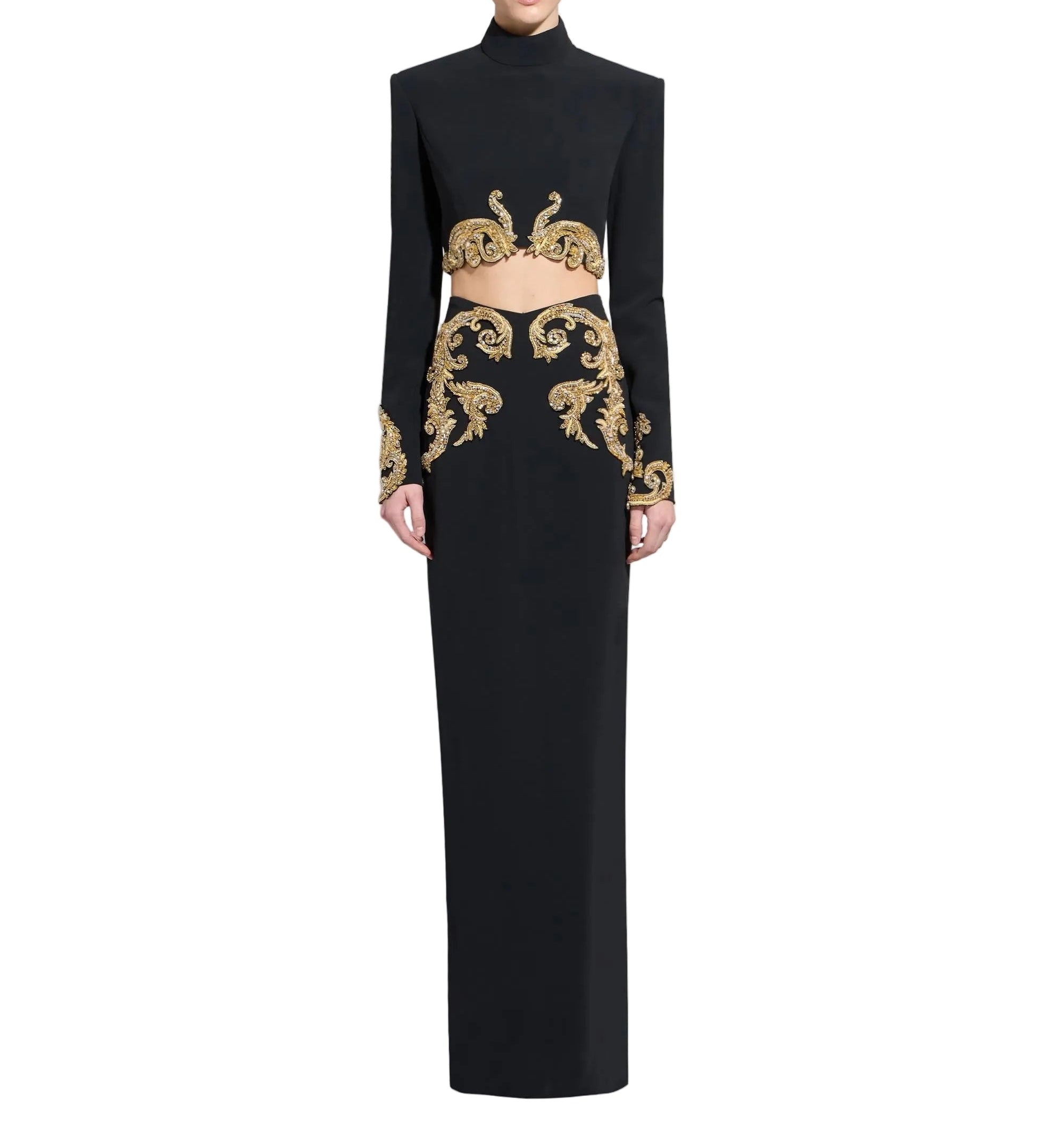 Black high-neck long-sleeved crop top and matching floor-length maxi skirt with gold crystal baroque embellishments.