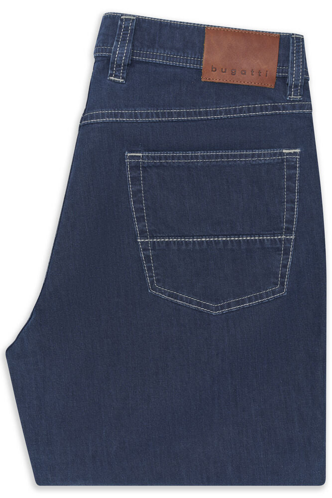 Dark blue denim jeans with white contrast stitching, a single back pocket with a horizontal stitch line, and a brown "bugatti