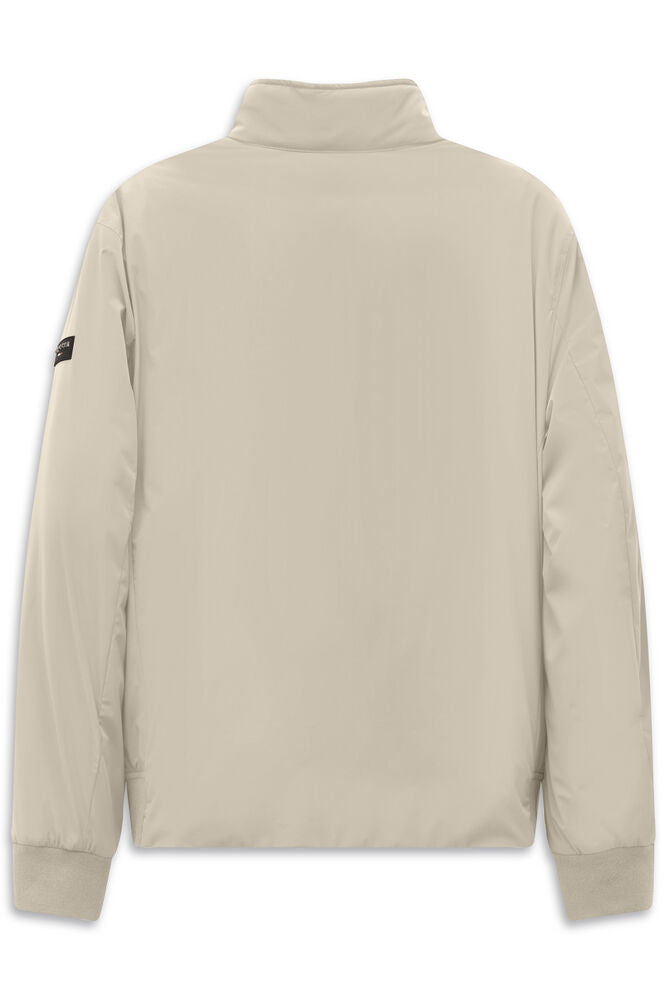 Beige jacket with a stand-up collar, ribbed knit cuffs and hem. Small dark patch on the left sleeve.