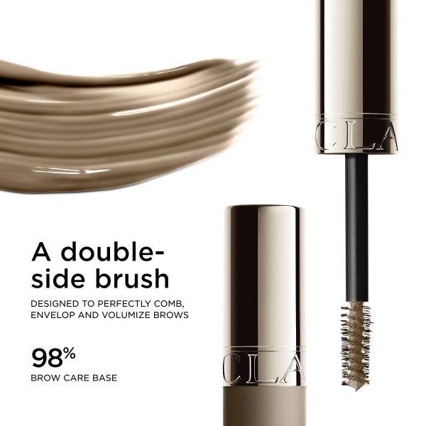 Brow gel tube with a gold-toned cap and matte brown body. The applicator has a tapered brush with light brown bristles.