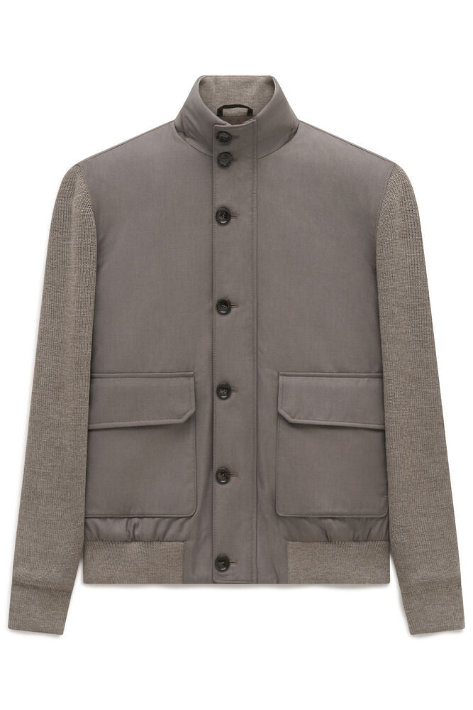 Bugatti men's bomber jacket in beige, featuring a woven body, ribbed knit sleeves, stand collar, and button-front closure.