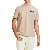 Beige short-sleeved crew neck t-shirt with a dark blue embroidered graphic of two polo players on horseback on the left chest