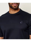 Midnight blue crewneck T-shirt with a small, dark, embroidered stylized animal logo on the left chest.